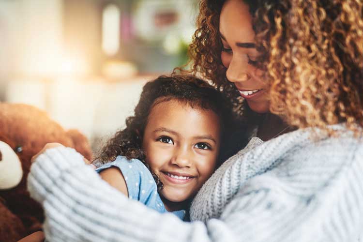 Mother and child smiling