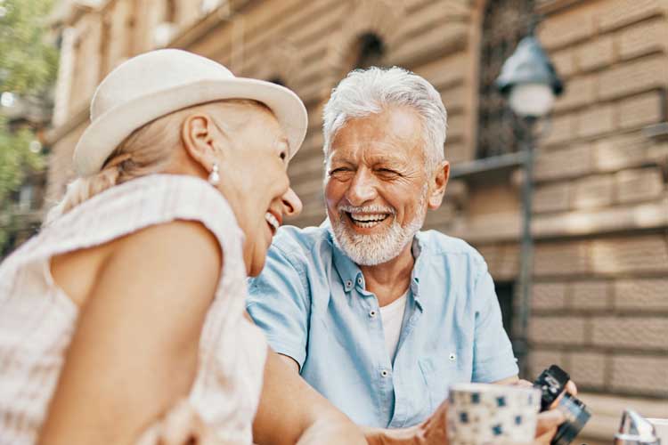 Older couple smiling at each other