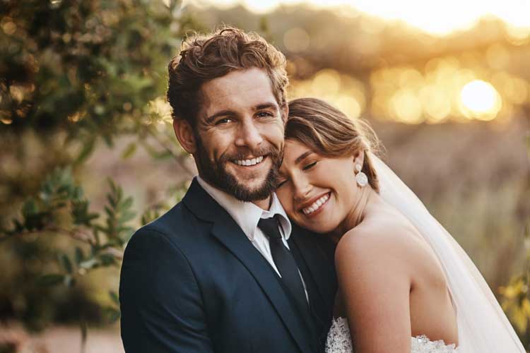 Wedding couple smiling